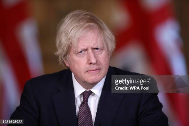 Prime minister Boris Johnson attends a virtual Covid-19 news conference at 10 Downing Street on March 8, 2021 in London, England.