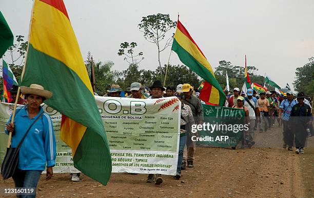 Hundreds of natives from the low-lying Amazon basin inlands walk during a protest march heading to La Paz against a road project through a nature...