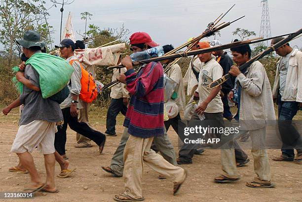 Hundreds of natives from the low-lying Amazon basin inlands walk during a protest march heading to La Paz against a road project through a nature...