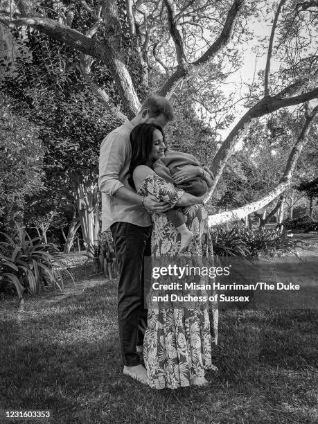 In this handout photo released on March 8 Prince Harry, Duke of Sussex and Meghan, Duchess of Sussex pose with son Archie Harrison...