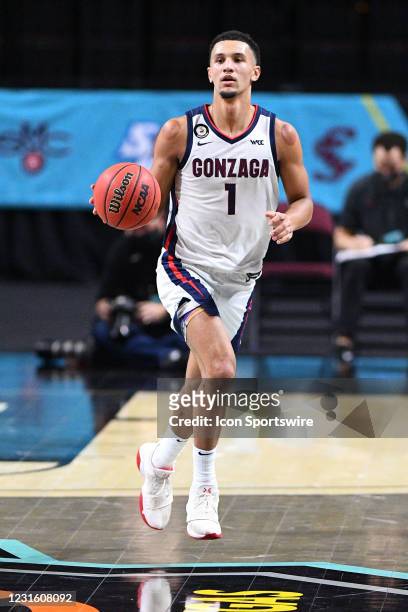 Gonzaga guard Jalen Suggs dribbles up the court during the semifinal game of the men's West Coast Conference basketball tournament between the St....