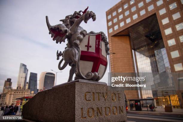 Statue of a dragon marking the boundary of the City of London, U.K, on Monday, March 8, 2021. Values in the U.K. Capital should jump about 25% over...