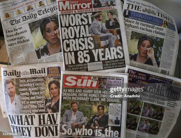 An arrangement of UK daily newspapers show front page headlines reporting on the story of the interview given by the Duchess of Sussex, Meghan Markle...