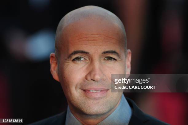 Actor Billy Zane smiles as he arrives at the world premiere of Titanic 3D in central London on March 27, 2012. AFP PHOTO/ CARL COURT