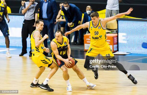 Marcus Eriksson of Alba Berlin, Karsten Tadda of the EWE Baskets Oldenburg and Ben Lammers of Alba Berlin during the game between ALBA Berlin against...