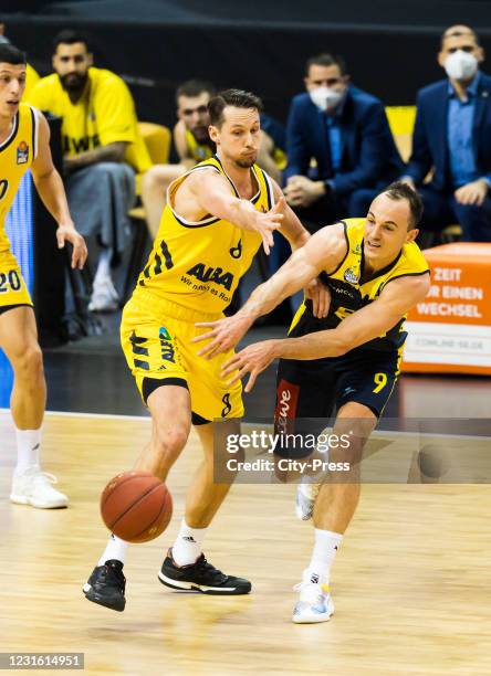 Marcus Eriksson of Alba Berlin and Karsten Tadda of the EWE Baskets Oldenburg during the game between ALBA Berlin against the EWE Baskets Oldenburg...