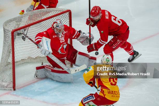 Damien Brunner of EHC Biel tries to score against Goalie Luca Boltshauser of Lausanne HC during the Swiss National League game between Lausanne HC...