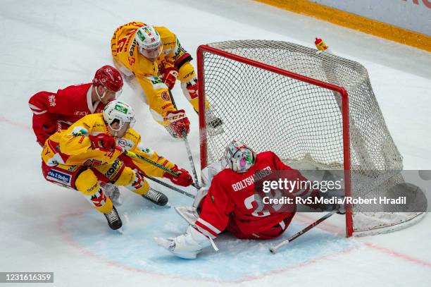 Samuel Kreis of EHC Biel scores a goal against Goalie Luca Boltshauser of Lausanne HC during the Swiss National League game between Lausanne HC and...