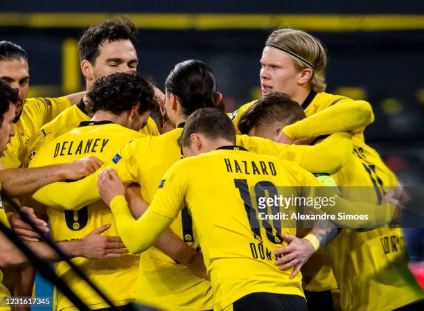Erling Haaland of Borussia Dortmund celebrates scoring the opening goal with his team mates during the Champions League match between Borussia...