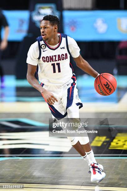 Gonzaga forward Joel Ayayi dribbles up the court during the semifinal game of the men's West Coast Conference basketball tournament between the St....