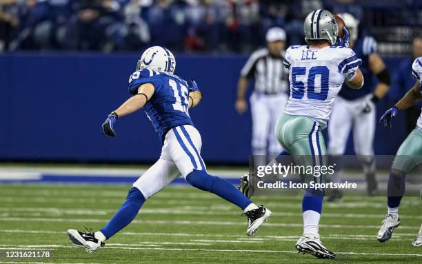 Dallas Cowboys linebacker Sean Lee intercepts a pass intended for Indianapolis Colts wide receiver Blair White in game action. The Dallas Cowboys...