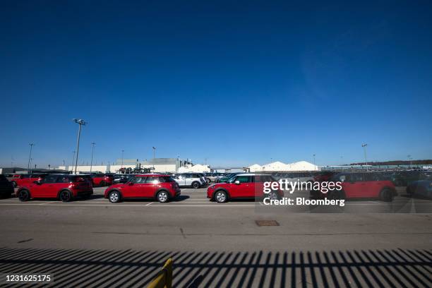 Finished Mini automobiles at Bayerische Motoren Werke AG's Mini final assembly plant in Cowley near Oxford, U.K., on Tuesday, March 9, 2021. BMW are...