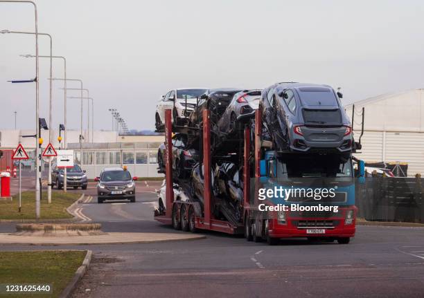 Car transportation vehicle carries finished Honda automobiles from the Honda Motor Co.'s final assembly plant in Swindon, U.K., on Tuesday, March 9,...
