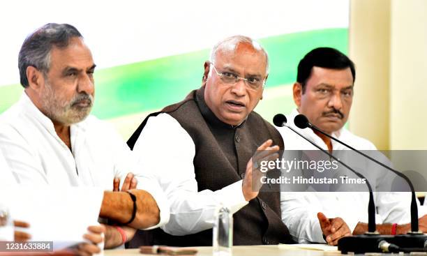Congress Party Leader and member of Parliament Mallikarjun Kharge, Anand Sharma, Akhilesh P Singh, addressing media persons on the issue of Petroleum...