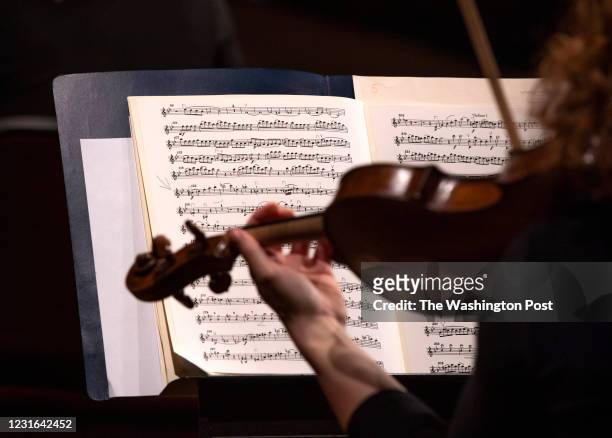 Maestro Gianandrea Noseda, who recently returned from Italy, rehearses with a small contingent of orchestra members at the Kennedy Center for a...