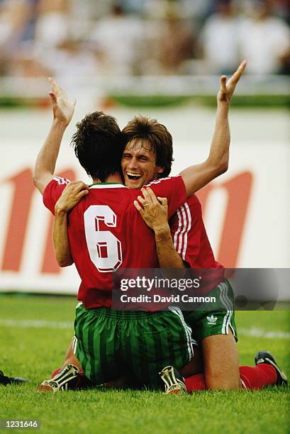 Sousa and Carlos Manuel of Portugal celebrate during the World Cup match against England at the Tecnologico Stadium in Monterrey, Mexico. Portugal...