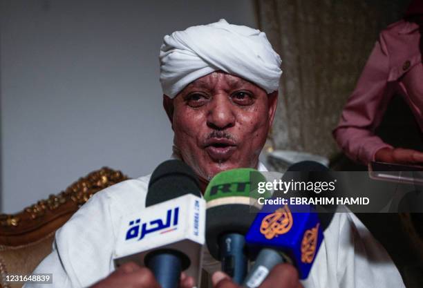 Sudanese Janjaweed militia chief Musa Hilal talks to reporters after his release in the Maamoura suburb of the capital Khartoum, on March 11, 2021. -...