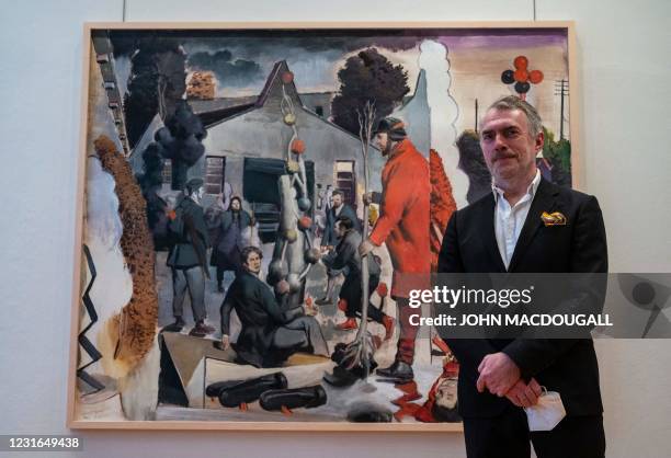 German Neo Rauch German painter Neo Rauch poses in front of his painting
