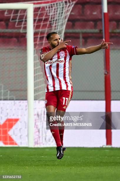 Olympiakos' Morocco's forward Youssef El-Arabi celebrates after scoring a goal during the UEFA Europa League round of 16 first-leg football match...