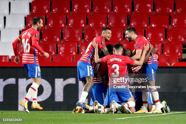 Roberto Soldado of Granada CF celebrates 2-0 with Maxime Gonalons of Granada CF, Dimitri Foulquier of Granada CF, Antonio Puertas of Granada CF...