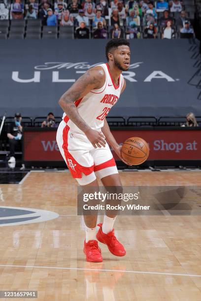 Justin Patton of the Houston Rockets dribbles the ball during the game against the Sacramento Kings on March 11, 2021 at Golden 1 Center in...