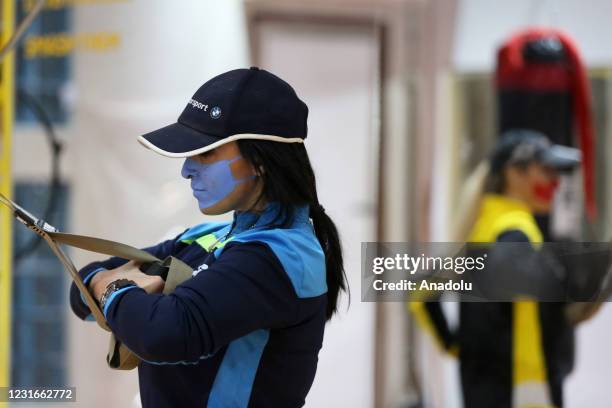 Maryam, Salume and world powerlifting champion Leyla Deravi sisters are seen during their exercise in Tehran, Iran on March 10, 2021. Maryam, Salume...