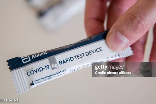 March 2021, Bavaria, Nuremberg: A Covid-19 antigen rapid test taken at a testing station for students and staff at Sigena High School. To enable safe...