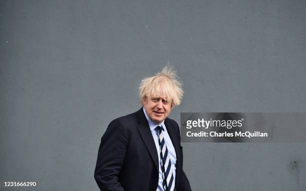 British Prime Minister Boris Johnson pictured as he leaves the Lakeland Forum vaccination centre on March 12, 2021 in Enniskillen, Northern Ireland....