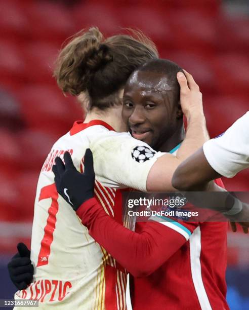 Naby Keita of FC Liverpool looks on during the UEFA Champions League Round of 16 match between Liverpool FC and RB Leipzig at Ferenc-Puskas-Stadion...