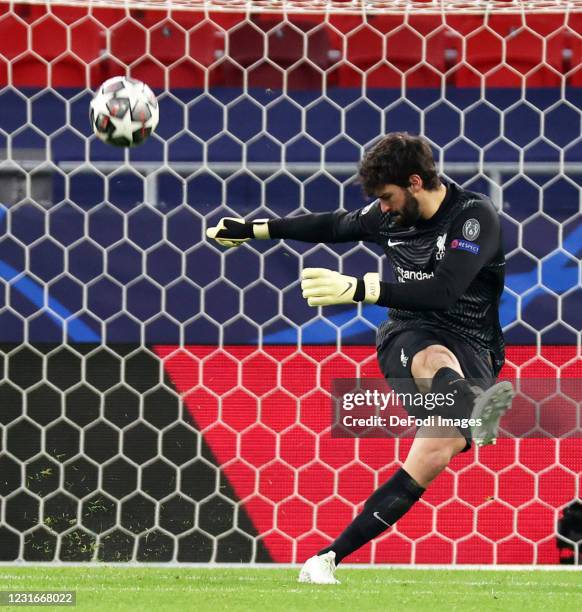 Alison Becker of FC Liverpool controls the ball during the UEFA Champions League Round of 16 match between Liverpool FC and RB Leipzig at...