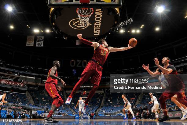 Cedi Osman of the Cleveland Cavaliers rebounds the ball during the game against the Orlando Magic on January 4, 2021 at Amway Center in Orlando,...