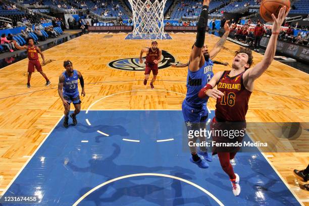 Cedi Osman of the Cleveland Cavaliers drives to the basket during the game against the Orlando Magic on January 6, 2021 at Amway Center in Orlando,...