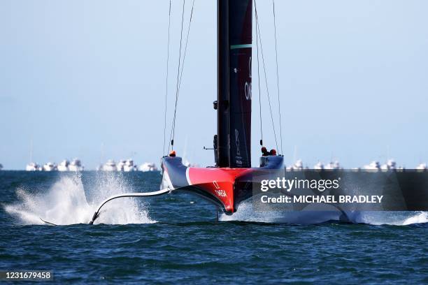 Emirates Team New Zealand competes with Luna Rossa Prada Pirelli during race five on day three of the 36th America's Cup in Auckland on March 13,...