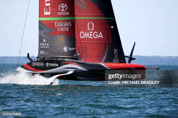 Emirates Team New Zealand competes with Luna Rossa Prada Pirelli during race five on day three of the 36th America's Cup in Auckland on March 13,...