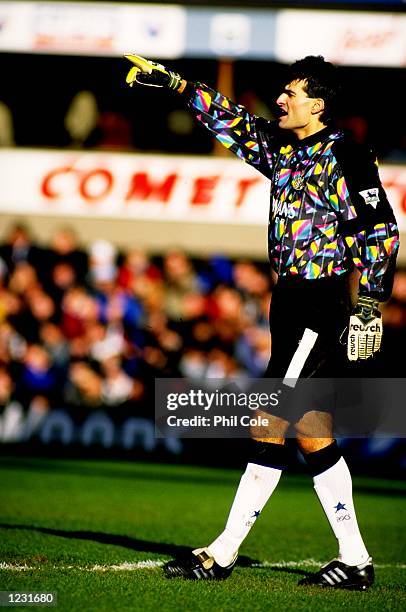 Newcastle United goalkeeper Pavel Srnicek indicates to team mates during the FA Cup Fifth Round match against Manchester City at St James'' Park in...