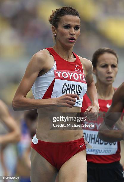 Habiba Ghribi of Tunisia competes in the women's 3000 metres steeplechase heats during day one of the 13th IAAF World Athletics Championships at the...