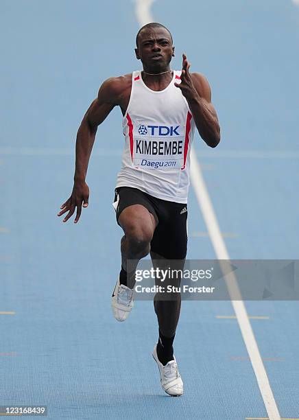 Delivert Arsene Kimbembe of Congo competes in the men's 100 metres preliminary round during day one of the 13th IAAF World Athletics Championships at...
