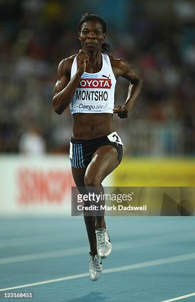 Amantle Montsho of Botswana competes in the women's 400 metres heats during day one of the 13th IAAF World Athletics Championships at the Daegu...
