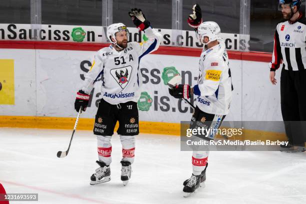 David Desharnais of HC Fribourg-Gotteron celebrates his goal with Viktor Stalberg of HC Fribourg-Gotteron during the Swiss National League game...