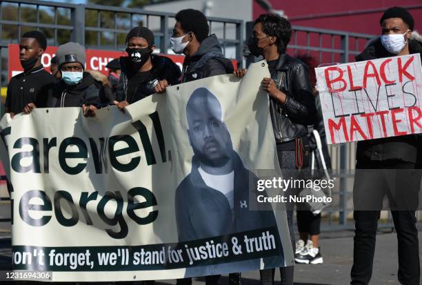 Mourners gather outside as the coffin of George Nkencho, a 27-year-old man was shot dead by Gardai outside his Dublin home last December, is taken...