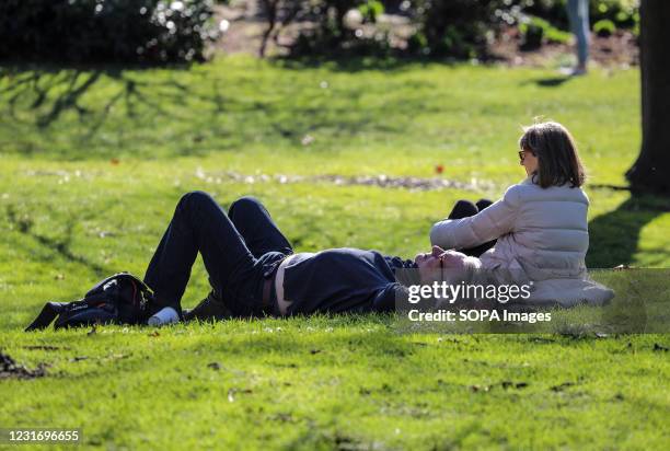 Couple seen relaxing in St James' Park.