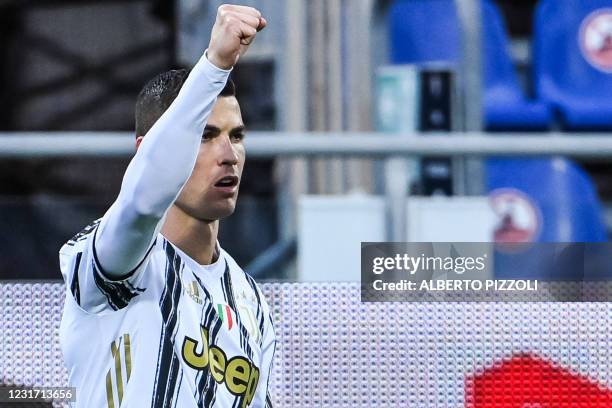 Juventus' Portuguese forward Cristiano Ronaldo celebrates after opening the scoring during the Italian Serie A football match Cagliari vs Juventus on...