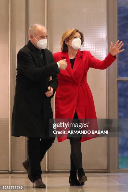 Rhineland-Palatinate's State Premier and top candidate of the social democratic SPD party Malu Dreyer and her husband Klaus Jensen arrive after exit...