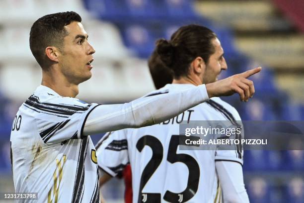 Juventus' Portuguese forward Cristiano Ronaldo celebrates after scoring his second goal during the Italian Serie A football match Cagliari vs...