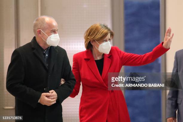 Rhineland-Palatinate's State Premier and top candidate of the social democratic SPD party Malu Dreyer and her husband Klaus Jensen arrive after exit...