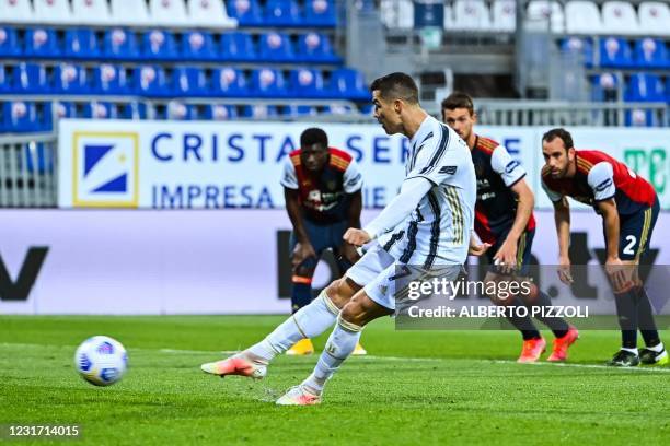 Juventus' Portuguese forward Cristiano Ronaldo shoots a penalty to score his second goal during the Italian Serie A football match Cagliari vs...