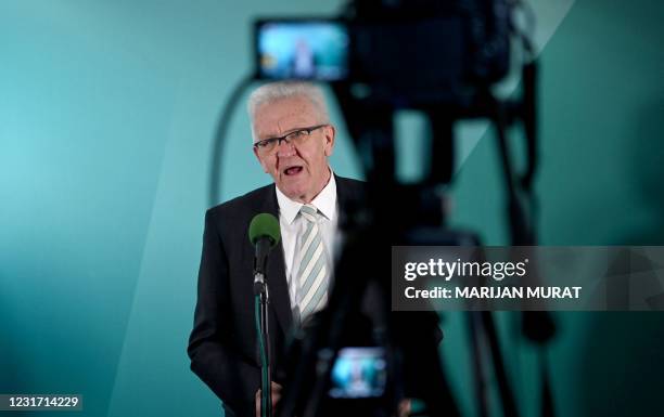 Baden-Wuerttemberg's State Premier and top candidate of the Greens Winfried Kretschmann addresses a pres conference after exit poll results are...