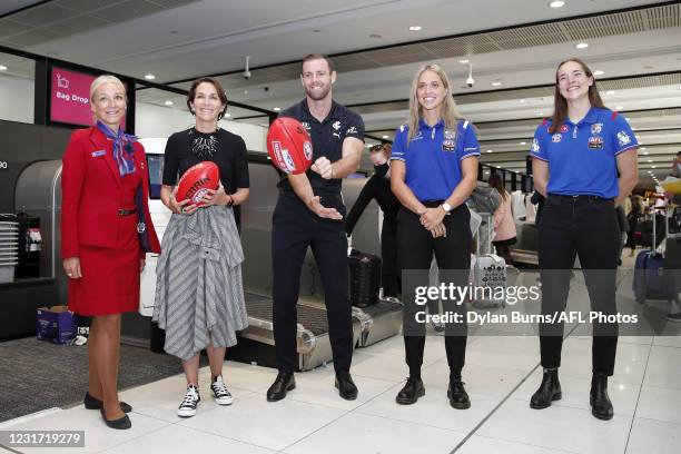 Sam Docherty of the Blues, Isabel Huntington of the Bulldogs, Jayne Hrdlicka, Chief Executive Officer of Virgin Australian and Kaitlyn Ashmore of the...