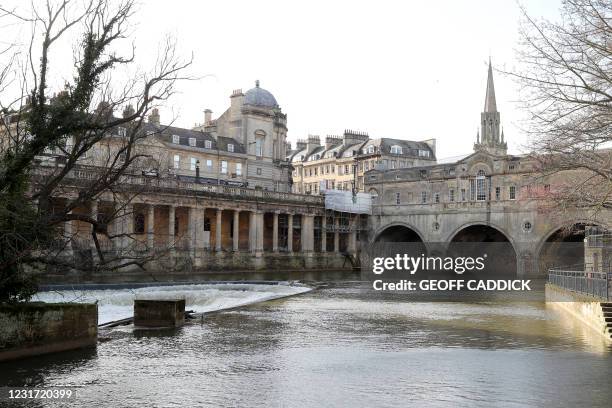 Picture shows Pulteney Bridge spanning the River Avon in Bath, southwest England, on March 12, 2021. - From March 15, drivers of polluting vehicles...