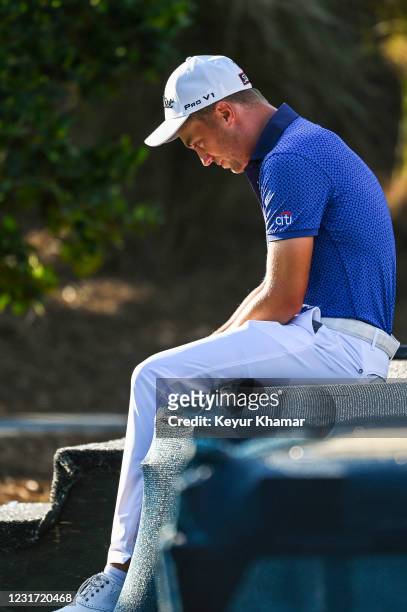 Justin Thomas sits and gets emotional following his one stroke victory in the final round of THE PLAYERS Championship on the Stadium Course at TPC...